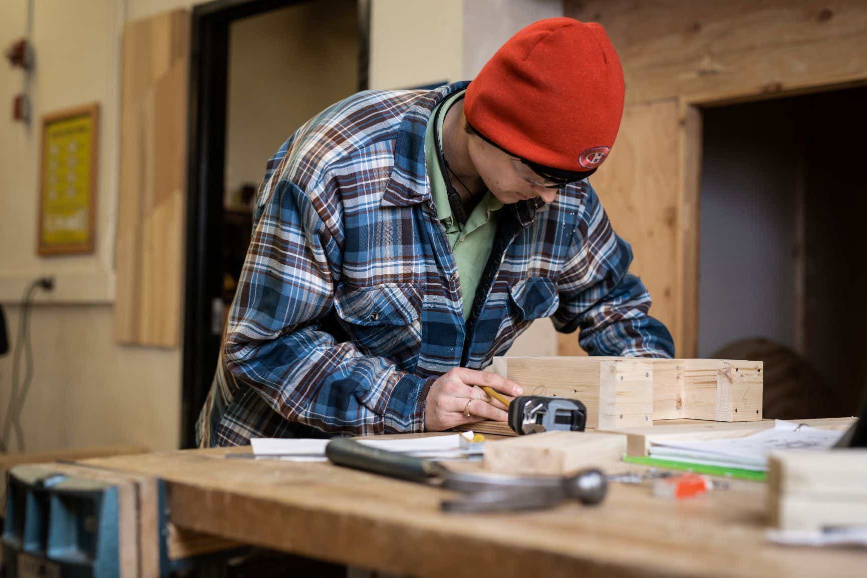 man doing hands on carpentry